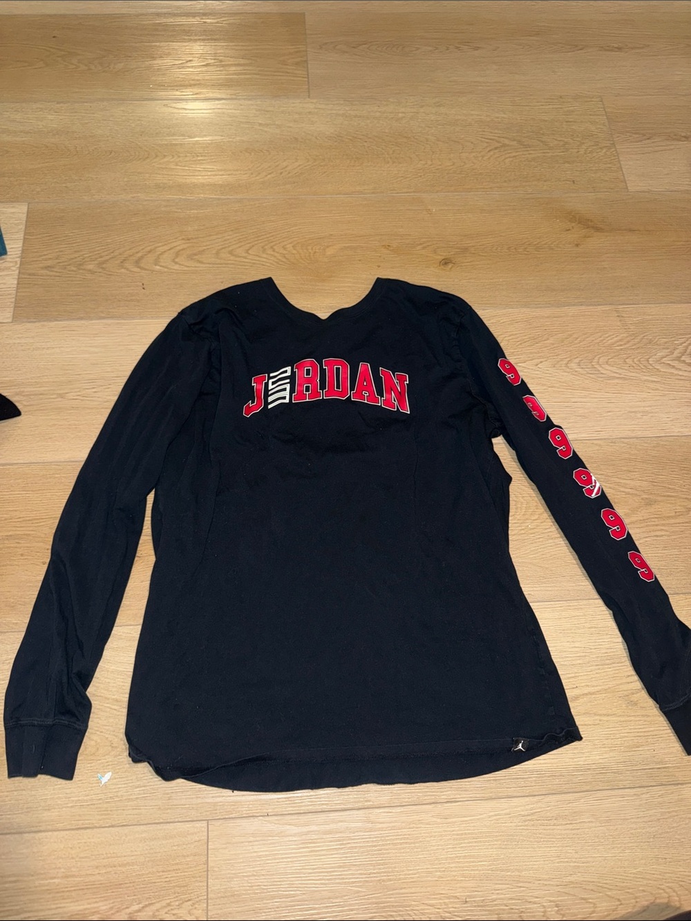 Jordan Black Long Sleeve Shirt with Red Logo and Sleeve Graphics